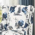 Fauteuil club haut à motif floral beige et bleu avec pieds en bouleau