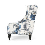 Fauteuil club haut à motif floral beige et bleu avec pieds en bouleau